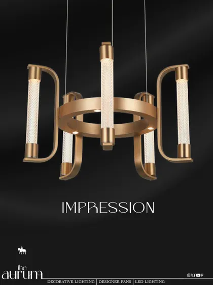 The 'Impression' chandelier is a modern classic, combining a brushed gold frame with textured crystal cylinders. I recommend this fixture for dining rooms or boardrooms where you want to make a statement of confident luxury.