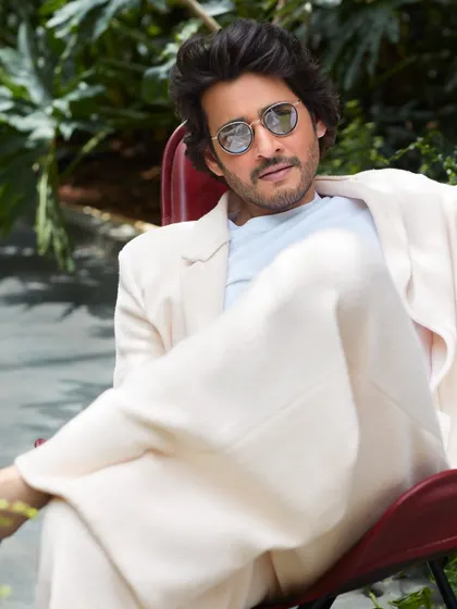 A close-up portrait of Mahesh Babu from the Hello! shoot. The natural light and relaxed posture give this image a candid, authentic quality, capturing his easygoing charm.