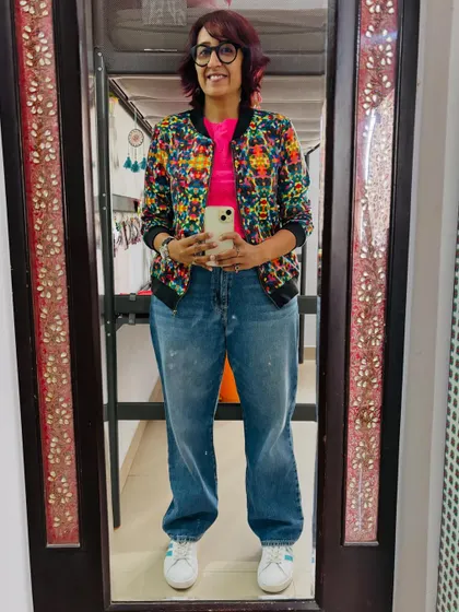 My go-to casual look for a fun day at the office. A bright crop top, comfy jeans, and a colorful jacket that goes with everything.