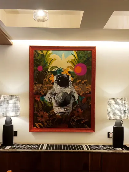 Another shot of the 'Recuperation' painting in its final setting. The red frame was chosen to add extra vividness and complement the colors within the artwork.
