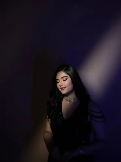 I love playing with light and shadow to create dramatic, artistic portraits for my clients once their look is complete.