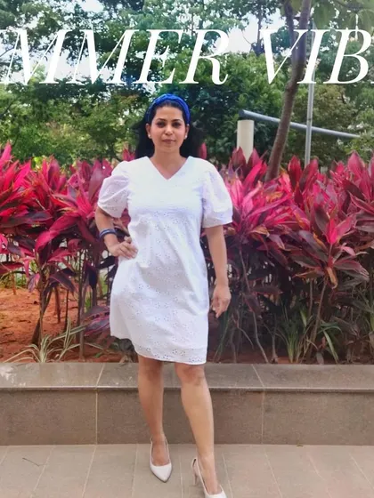 The little white dress is my ultimate summer staple. It's fresh, versatile, and the perfect canvas for adding a pop of color with accessories, like this blue headband.