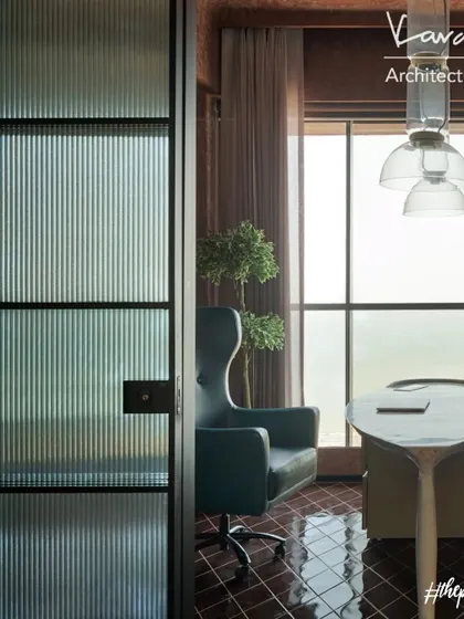 A view into the den from the living area, through a reeded glass partition. This creates a sense of separation while still allowing light and a visual connection between the spaces.