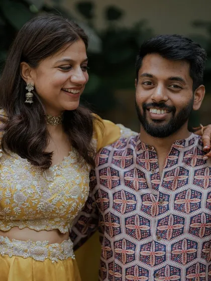 A candid moment of affection between the couple.