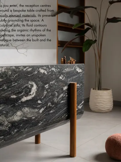 A quote from our feature in ArchDigest, describing the bespoke, locally sourced materials used in our studio's reception area.