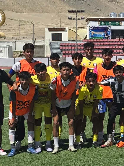 A group of our younger players posing with the coach before a friendly match in Ladakh. The energy is unstoppable.