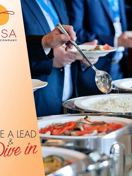 We design our buffet menus to be exciting and varied, moving beyond monotonous corporate meals. This image captures guests enjoying a diverse selection, a key part of our cyclic menu planning for regular office catering.