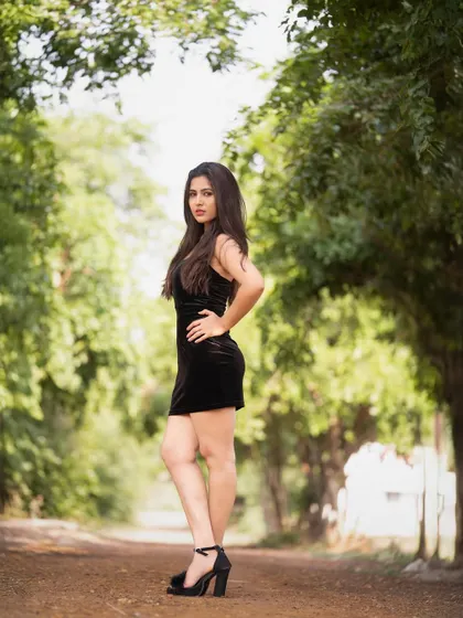 Another full-length shot of Apurva, this time from a different angle to highlight her profile.