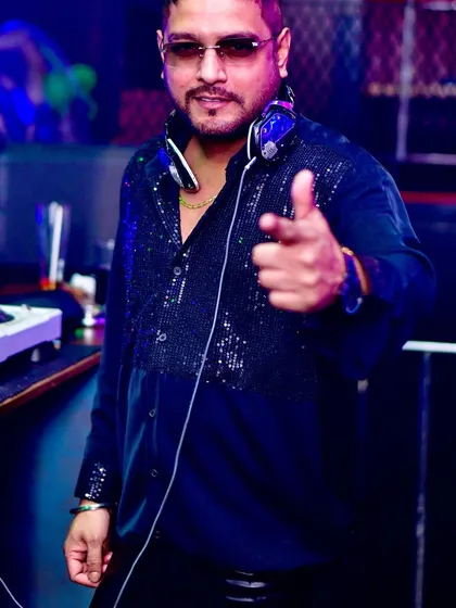 Pointing right at you. A confident shot from my gig at Hydra Club, where I brought the biggest Bollywood hits.