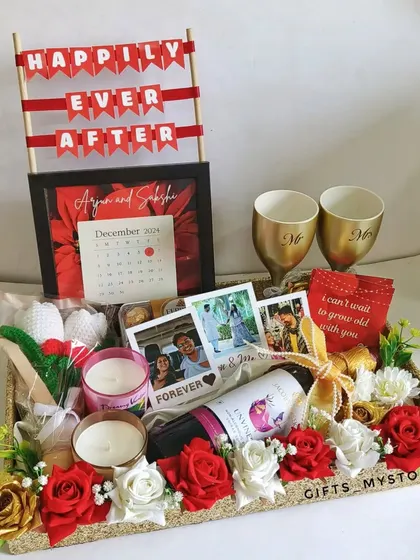 The complete wedding day hamper, beautifully arranged on a decorative tray. It's the perfect gift for a partner on your special day.