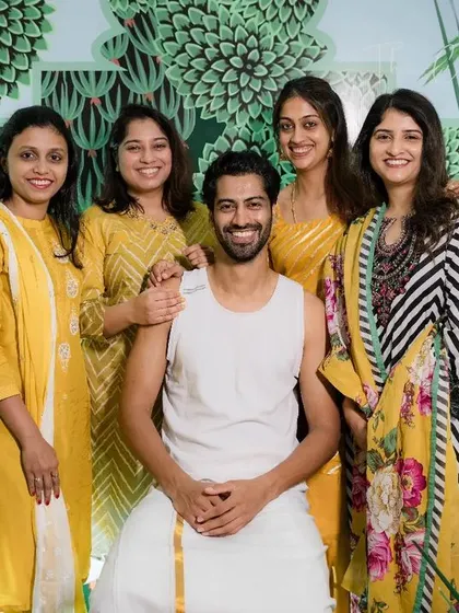 The groom surrounded by his bride tribe. Our decor is designed to be the perfect frame for the cherished memories you'll make with your closest friends.