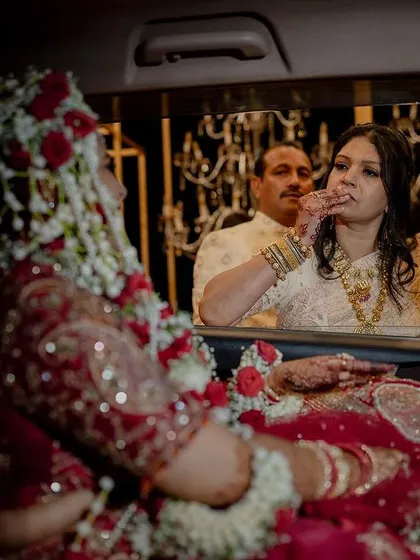 The vidaai, an emotional farewell. We capture the bittersweet tears and tight hugs that mark the bride's departure to her new home.