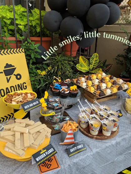 A construction-themed kids' party with cleverly named treats like "nuts and bolts" (pretzels) and "wooden planks" (wafers). We love getting creative with themes to make every party unique.