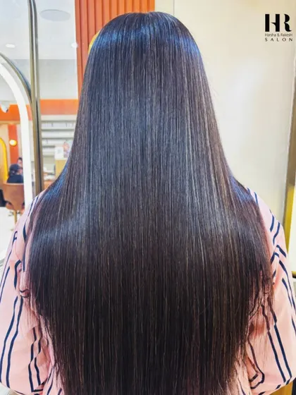 The "after" shot of the Hair Botox treatment. The result is smooth, sleek, and healthy-looking hair with a beautiful shine.