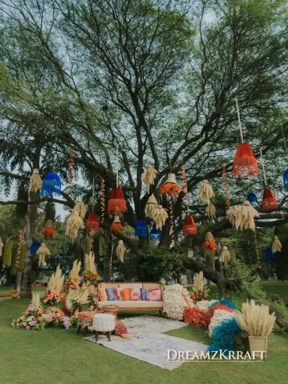 We transformed a farmhouse lawn into a vibrant Moroccan souk for this Mehendi celebration. A majestic tree became the centerpiece, adorned with colorful lanterns and tassels, creating a festive and culturally rich setting for the day.