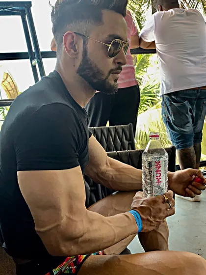 A dream takes sweat, determination, and hard work. This shot captures the vascularity that is a result of low body fat and consistent training.