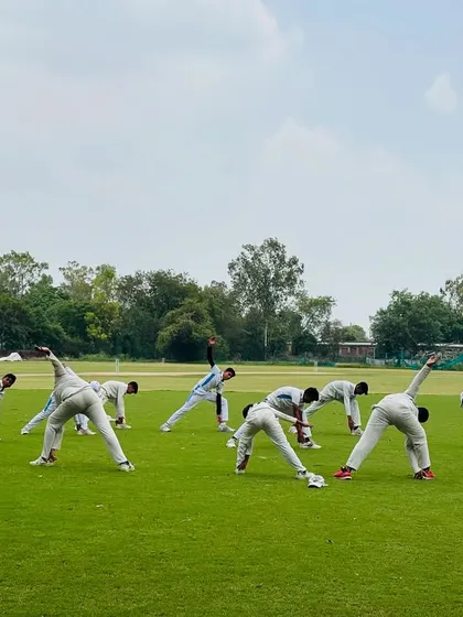 The team goes through a dynamic stretching routine. This helps in increasing blood flow and preparing muscles for intense action.