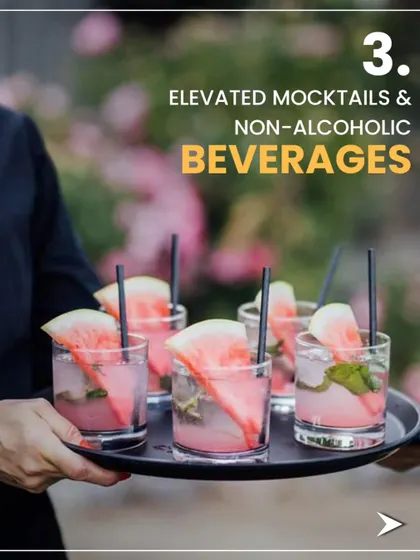 We keep up with the trends, like elevated mocktails and non-alcoholic beverages. A server presents a tray of refreshing watermelon mocktails.