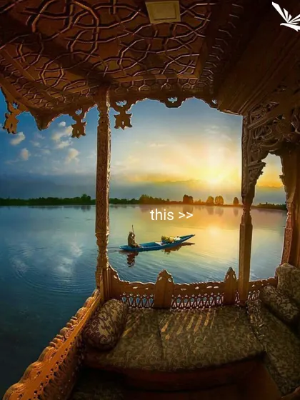 The view from a Shikara on Dal Lake in Kashmir. Our captains know the best spots to capture these serene and iconic moments.
