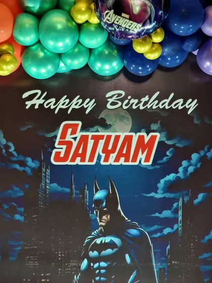 A personalized Batman backdrop for Satyam's party, adding another iconic hero to the mix.