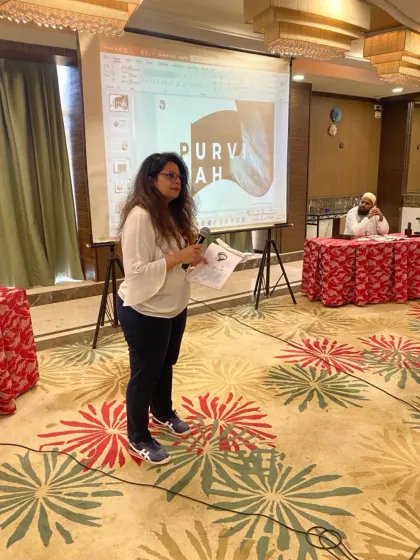 Here I am speaking at an event, sharing my story and my passion for design. For me, design is not just about aesthetics; it's about creating emotions and memories. Every project is a personal journey, crafted with love, function, and a touch of magic.