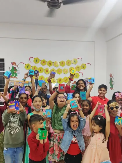 So much excitement! These partygoers are thrilled with the colorful pen stands they designed and painted all by themselves during a birthday celebration.