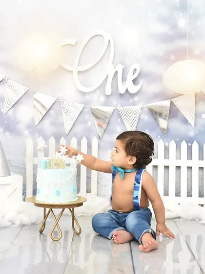That first taste of birthday cake is a moment to remember. This cake smash photo captures his curiosity and the start of a fun, messy celebration.