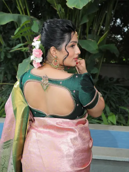 Another angle of the stylish heart-shaped cutout blouse back.