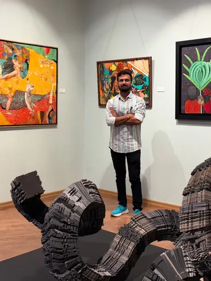 Visiting the 64th National Exhibition of Art at Lalit Kala Academy in New Delhi, surrounded by inspiring sculptures and paintings.