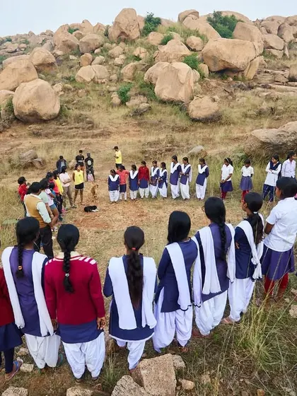 The girls gather in a circle for a quick introduction to bouldering and safety. We hope to make these sessions a regular part of our outreach work.