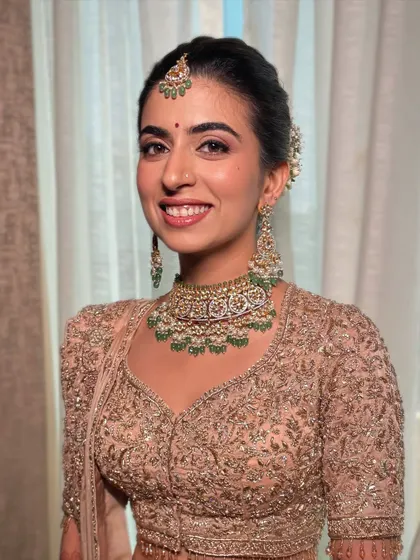 Another shot of this glowing bride. Her makeup is fresh and light, perfect for a day wedding.