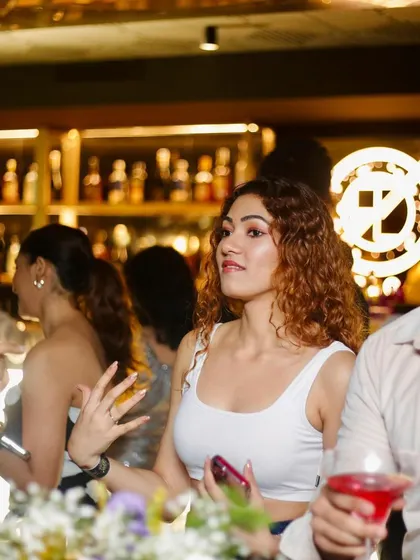A duplicate of the bar scene, showing the social side of a great club night.