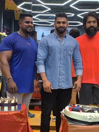 Another shot from a celebration at Kitty's Muscle Planet with Yash and my uncle. It's great to see high-profile clients become part of our gym family.