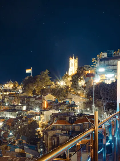 The city of Shimla twinkling at night, with the iconic Christ Church illuminated on the ridge. Hill stations have a special charm after dark.
