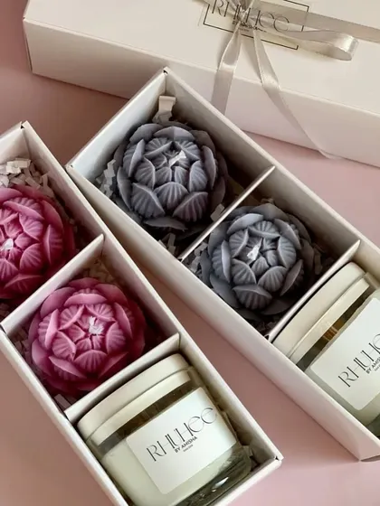 A flawless gift set for intimate gatherings. This box includes two lotus-shaped candles and a monochromatic jar candle, all for just ₹499. Perfect for a friend's birthday.