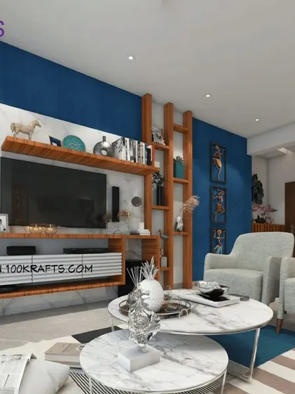 This modern ethnic living room features a deep blue accent wall and a wooden TV unit adorned with traditional figurines.