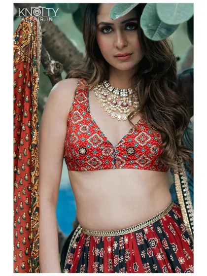 A stunning close-up of actress Malvika Raaj in a beautiful, traditional lehenga for her pre-wedding shoot. We excel at capturing celebrity and high-profile events.
