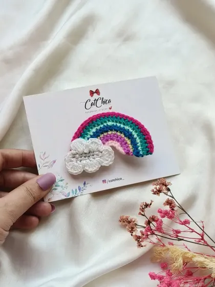Our crochet rainbow with a cloud, a symbol of hope and happiness that I love to create.