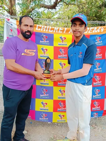 A U-14 player is recognized for his match-winning contribution with a Man of the Match trophy.