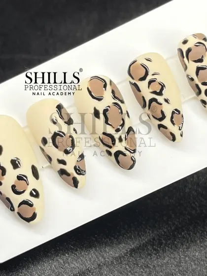 A classic and perfectly executed leopard print design, hand-painted for a timelessly fierce look.