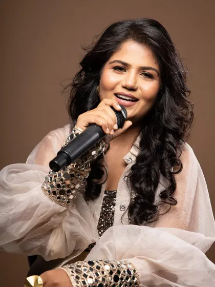 Beyond bridal, I specialize in makeup for photoshoots and performers. Here, I created a polished, camera-ready look for a singer, ensuring her makeup was flawless under professional studio lighting.