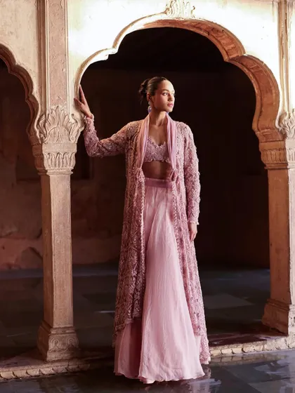 For this look, I styled a delicate embroidered jacket over a matching bralette and skirt. The goal was to create a layered, elegant silhouette that felt both traditional and modern for a bridal campaign.