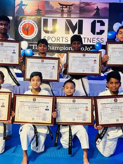 A group of our young students, now black belts, ready to take on the next chapter of their training.
