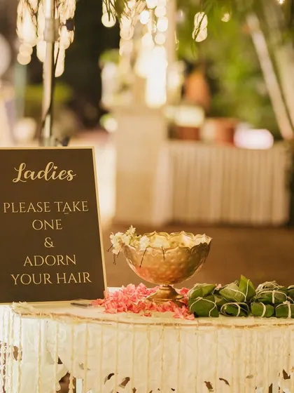 A thoughtful and charming detail from a 75th celebration. We set up a small table with traditional gajra (flower garlands) for the ladies to adorn their hair, adding a beautiful, interactive touch to the event.