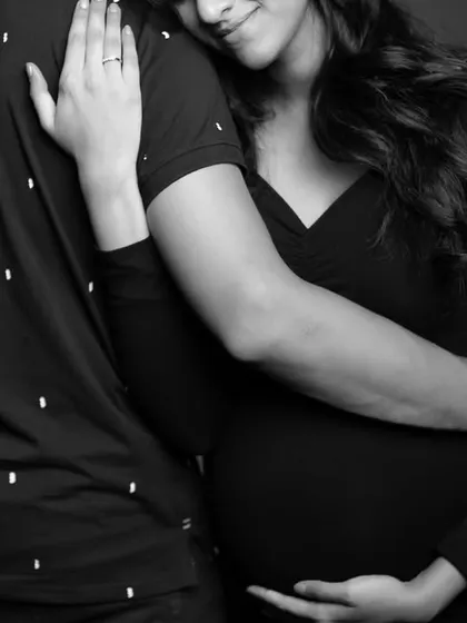 A tender embrace in black and white, this close-up shot focuses on the emotion and connection.