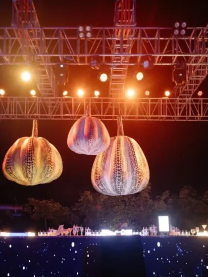 Custom-made, large-scale pumpkin lanterns, inspired by Yayoi Kusama's iconic art, hang over the bar. These thematic elements are key to creating a truly immersive and unique event.