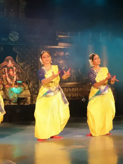A full gallery from a special performance in my hometown after 25 years, showcasing a full group of dancers on a professionally lit stage.