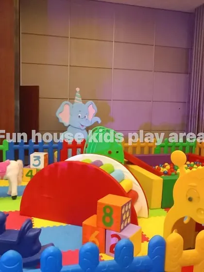 Another angle of the setup at The Palms, showing the caterpillar tunnel and elephant decor.