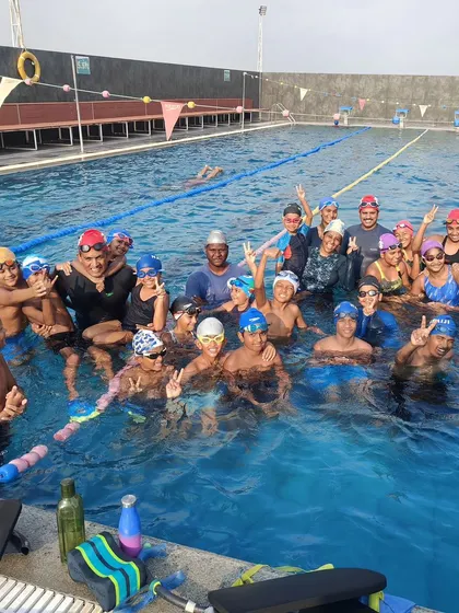 Yes, we teach swimming, but look at the pure, unadulterated joy on the faces of both the kids and the coaches. This is our advanced and pre-competitive group, a true swim family.