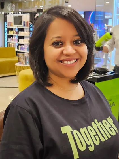 The smile says it all. This client is loving her new bob haircut, which is perfectly shaped to suit her face and lifestyle.